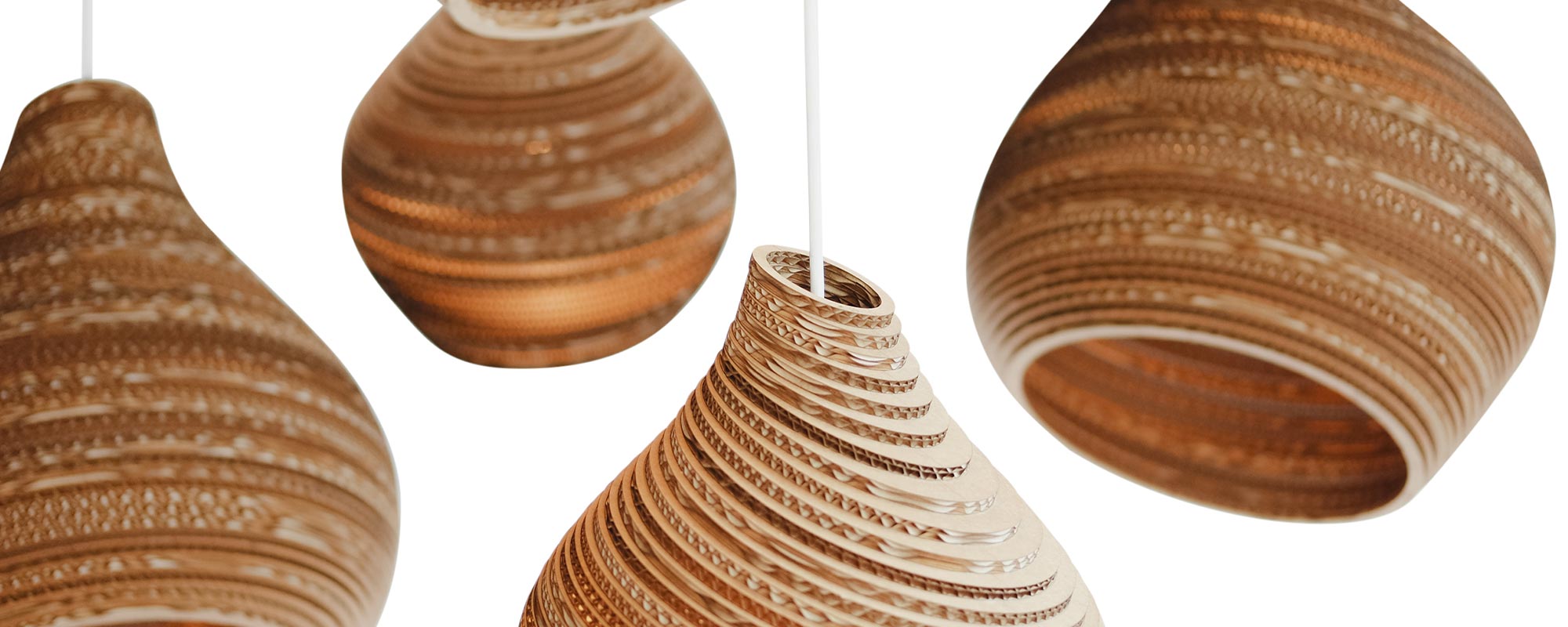 Natural light, textures, and tones instantly make a space feel right. Nature-inspired lighting captures that feeling indoors, and no sunny window is required. This month, we’re shining a light on one of our favorite interior trends: fixtures that bring the outdoors in.