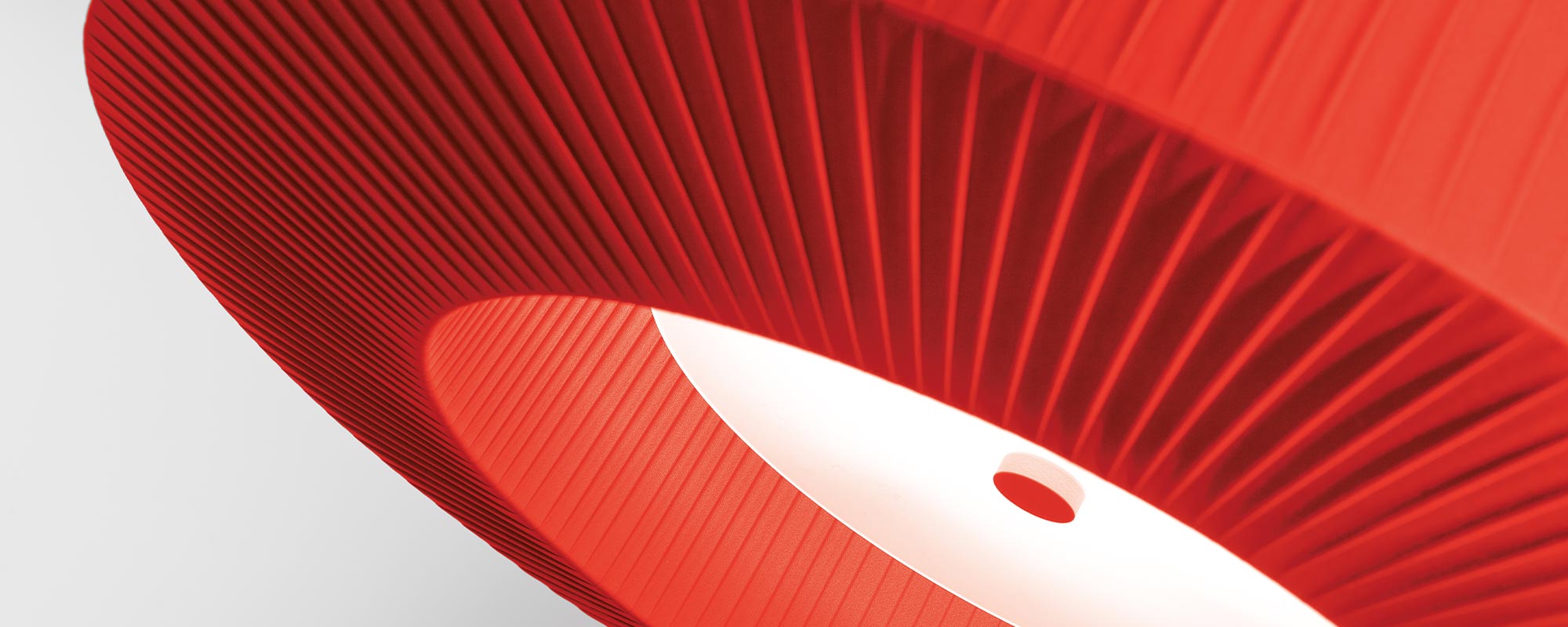 As the year winds down, it feels like the perfect time to reflect on how the spaces we design influence the way people think, focus, and connect. This month, we are highlighting acoustic lighting an emerging category that blends high-performance illumination with sound-absorbing materials to elevate both visual comfort and acoustic quality.